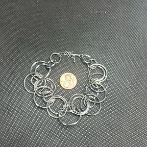 Combined ring bracelet three sizes of circles with extension and clasp closure